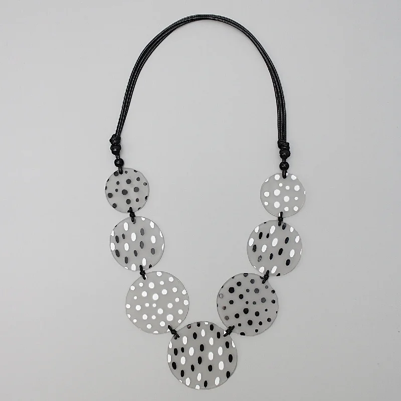 Silver Huggie Earrings Black and White Essie Necklace