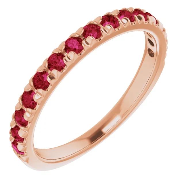 14KT GOLD 0.60 CTW RUBY FRENCH-SET ANNIVERSARY BAND